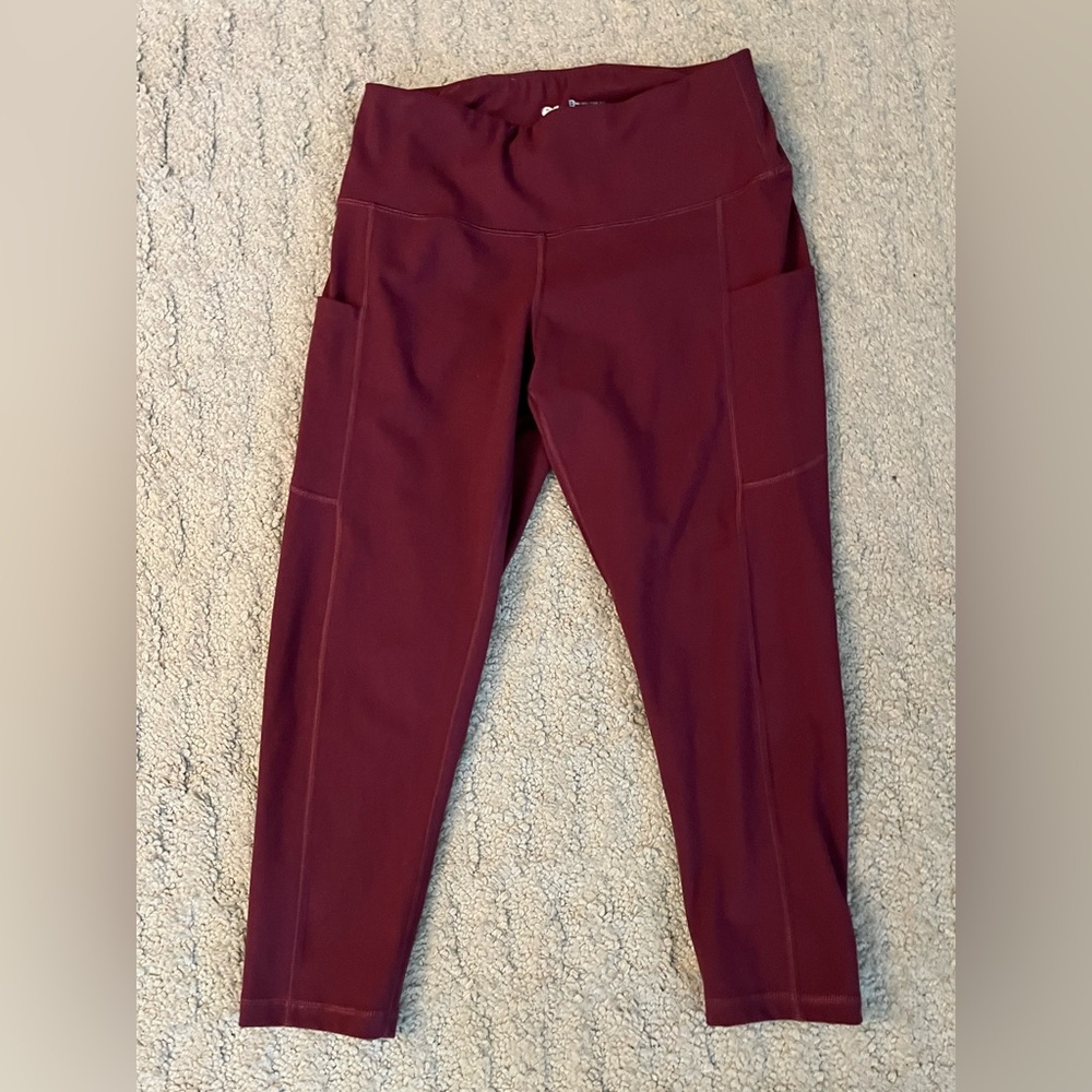 Iuga yoga pants. Burgundy with pockets on both sides.